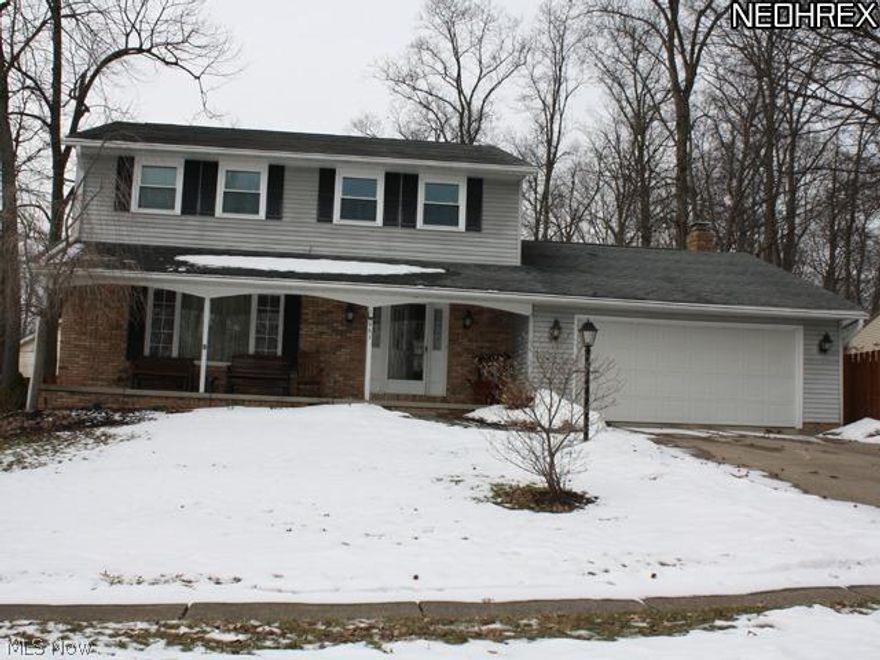 Welcome Home! Imagine yourself sitting on this inviting front porch when summer arrives! This home features a large eat-in kitchen with Corian counter tops, stainless steel appliances and a built-in planning desk. Wood floors from the front door all the way into the kitchen. Current owner added new Pella patio door, furnace w/humidifier, hot water tank and a/c. New windows, blinds & Leaf Guard gutters. Updated lighting throughout. Full basement is a must see with new glass block windows, epoxy floor, painted cinder blocks and bright lighting. Privacy fenced back yard w/large storage shed. Beautifully landscaped property with new landscape lighting. Wood-burning brick fireplace for cold winter nights. 3 closets in the master suite! Move-in ready!Home Warranty Provided.
