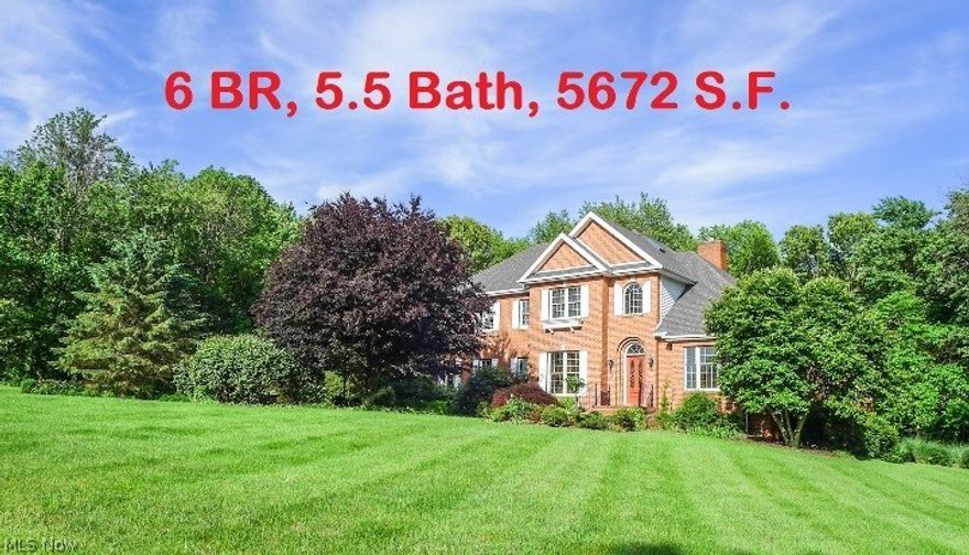 MULTI-GENERATIONAL POSSIBILITIES with this Stunning 3-Story Brick home in Hunter's Ridge ideally located between Mt. Vernon and Gambier. This grand home is custom built by Schrock builders and has all the premiere amenities which will make it a pleasure to own. From the 2 story entry a world of special details is immediately apparent. The first floor includes a formal living and dining room, handsome fireplace in great room, open stairway, upscale kitchen including a custom marble island and cherry cupboards, breakfast room, secluded first floor master suite, first floor laundry room, loads of custom designer built ins, and a half bath. Wheelchair ramp from 3 car garage into first floor. Impressive finished walkout lower level with separate entrance could serve as family-member or guest suite, complete with kitchenette, bedroom, full bath and large living area.  Boasting 5600+ finished s.f., with 5-6 bedrooms, 5 full baths, 1 half bath, 3 car garage, huge deck and patio, wooded backdro