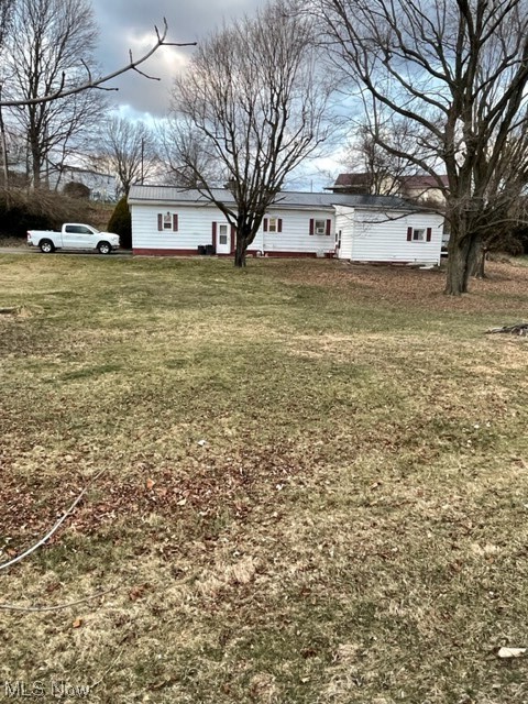 Ranch home situated on 3 parcels that total .908 acres. The ranch home has 3 bedrooms, 1 bathroom, attached garage and is located inside the village Conesville. Newer metal roof, some replacement windows, newer furnace and updated electric service. Needs some work on the inside. Some floors are unlevel, some peeling paint. Includes stove, refrigerator, washer and dryer, no warranties. Additional parcels #012213010024 and 0120000017900.