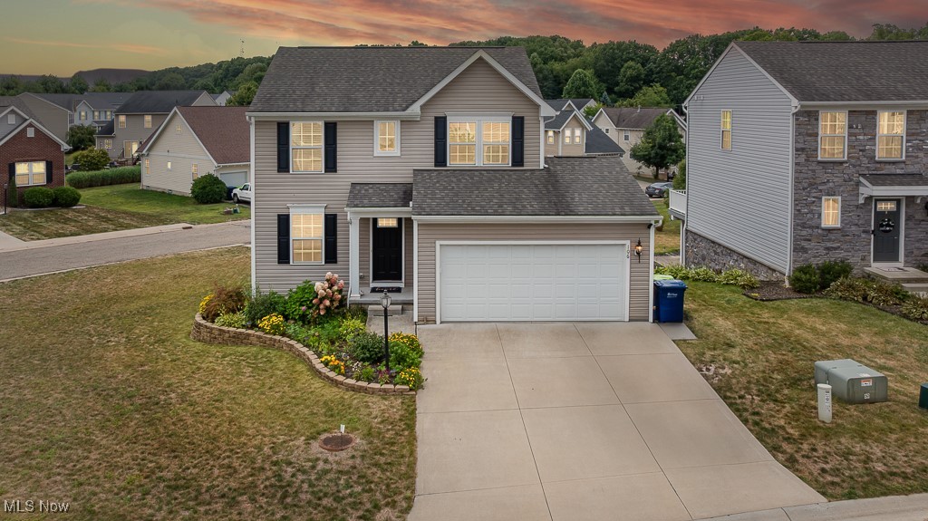 Welcome to this beautiful Colonial in Tallmadge featuring 3 bedrooms, 2 full baths, and 2 half bath! Inside you’ll find a cozy living room and a spacious kitchen with appliances included, plus a sunny dinette area with sliding doors that lead out to the deck. Underneath the deck, you’ll love the 13x10 waterproofed storage shed with a drainage system perfect for all your extras. The finished full basement provides the ideal family or recreation room, while the first-floor laundry adds convenience. Upstairs, the huge owners suite boasts a walk-in closet and private bath, along with two additional bedrooms that offer plenty of space. Enjoy outdoor living with the poured, stamped patio and attached 2-car garage, and take advantage of the Metroparks located just across from the development. This home combines comfort, functionality, and location, everything you’ve been looking for!