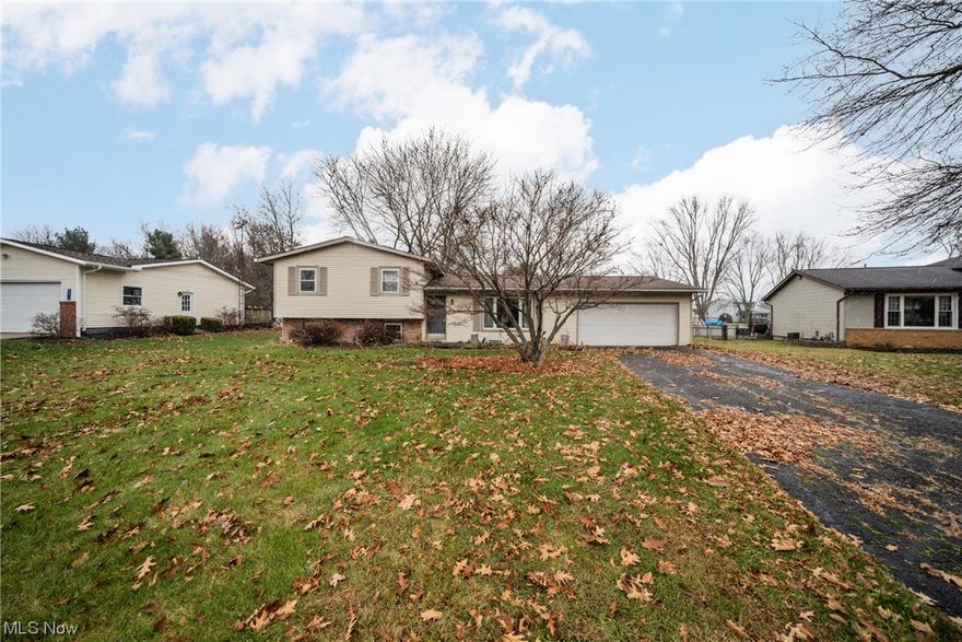 Affordability meets tranquility at this incredible opportunity in the Diamond Estates! Situated on just under a half acre, the opportunities are endless in creating a backyard oasis. This inviting split-level home features 3 bedrooms, 1 bathroom, and an oversized 2-car garage. Upon entering, you'll immediately notice the spacious living room that opens up to the dining room. The lower level greets you with a sliding back door that seamlessly connects the indoors to the outdoors, allowing for effortless entertaining and easy access to the expansive backyard. There's tons of potential for improvements in the kitchen. Downstairs, you'll find additional entertainment space available in the spacious family room. The full bathroom upstairs was tastefully remodeled by the previous owner and is adjacent to the three large bedrooms. Schedule your showing today to see all this home has to offer!