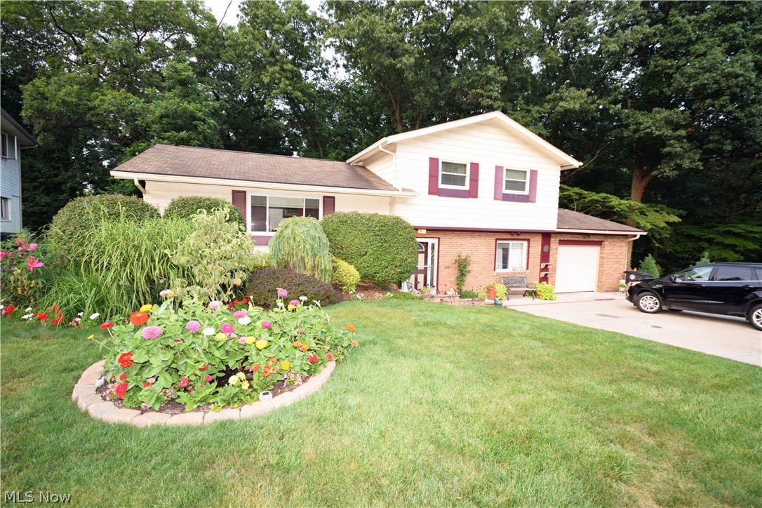 Come see this beautiful 3 bedroom, 2 bath spacious split level with many updates! This house is inviting inside and out! Serene park like yard which backs into Sand Run Metro Park! Amazing landscaping! Vaulted ceilings, new doors throughout including a beautiful front door with a unique glass design. Remodeled bathroom with a large shower tub! Enjoy the outside view while relaxing or entertaining friends on the enclosed patio. Set an appointment to see this home now!