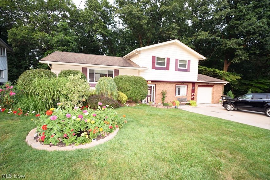 Come see this beautiful 3 bedroom, 2 bath spacious split level with many updates! This house is inviting inside and out!  Serene park like yard which backs into Sand Run Metro Park!  Amazing landscaping! Vaulted ceilings, new doors throughout including a beautiful front door with a unique glass design. Remodeled bathroom with a large shower tub! Enjoy the outside view while relaxing or entertaining friends on the enclosed patio. Set an appointment to see this home now!