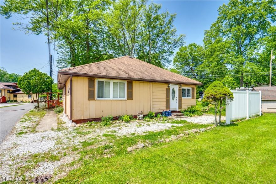 Welcome home to 4944 Coleman Dr! Nestled on a corner lot, this fantastic Portage Lakes home features three bedrooms and a full bath. Inside, you'll find a large living room with recessed lighting. Off the living room is the potential fourth bedroom and the dining room. The kitchen features tile flooring, tile counters, a fridge, and a range. There are three bedrooms, all carpeted. The updated full bath features vinyl flooring, a tile-surrounded shower, and a pedestal sink. Lastly, you'll find a nicely sized enclosed back patio. Outside, you'll find a nicely sized yard, a patio, and a shed for any outdoor storage needs. Plus, you are right down the street from Dano's and a close drive to everything Portage Lakes has to offer. Don't miss your chance to see this wonderful home; schedule your showing today!