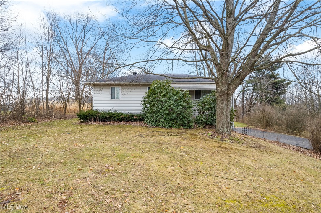 Welcome home to 2995 Wilbanks in Norton. This raised ranch has many upgrades and features to boast about! The home consists of roughly 1300 square feet, three bedrooms, two full baths and a finished basement. Entering into the large living room you are greeted with warm and tons of natural lighting. The eat-in-kitchen offers plenty of cabinetry space and adjoins to the cozy family room overlooking the private lot. There is tasteful carpet and paint throughout. There are three bedrooms on the first floor, all generous in size and they share the renovated full bathroom. The bathroom has extensive tile work, large vanity and heated floors. The lower level includes optional fourth bedroom/rec room and second full bath. Exterior features include almost 1/2 acre lot, spacious deck, shed and beautiful private views of a farm. Updates include newer vinyl windows, vinyl siding, cabinets painted in the kitchen, newer counter tops and tiled floor. Added family room in the back, newer HWT, well-pump replaced 12/24 & well was cleaned, and newer electrical panel. This home is awaiting its' new owner, call or text today for your private showing!