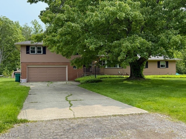 Welcome to this beautifully updated 3-bedroom, 2-bathroom split-level home, perfectly situated on nearly 1.5 acres just off Lake Road West. With a thoughtful blend of comfort and modern updates, this home is move-in ready and waiting for you. Major improvements include new windows (2017), furnace and AC (2017), a new roof (2023), and fresh cosmetic updates throughout (2024). The kitchen features appliances updated between 2022 and 2024, offering a modern touch to a warm and inviting space. Inside, the living areas are spacious and welcoming, ideal for relaxing or entertaining. Step outside to an expansive yard that offers room to enjoy the outdoors. Located just minutes from Walnut Beach, you’ll love the access to sandy shores, walking paths, and stunning Lake Erie sunsets. Whether you're looking for a peaceful retreat or a place to host family and friends, this home offers the perfect balance of location, comfort, and value. Schedule your private tour today and experience it for yourself!