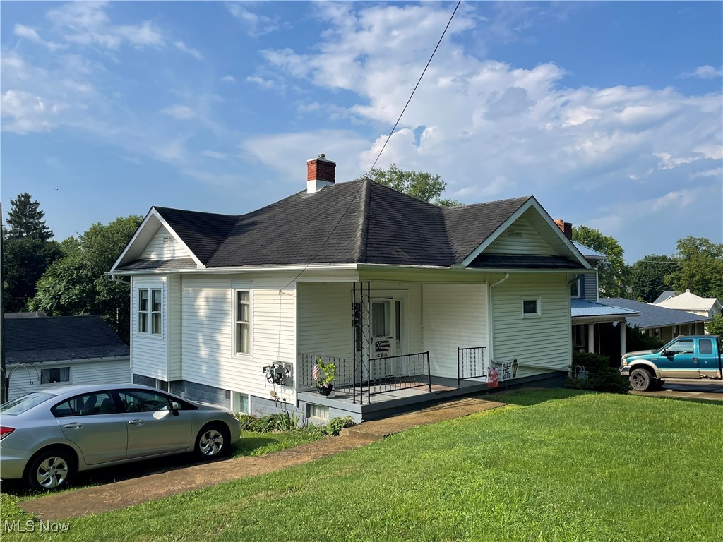 This cute and cozy home offers 2 bedrooms, 1.5 baths, living room with fireplace, dining area and nice size kitchen. The basement is partially finished and offers access to the back porch and a sidewalk that leads to the two-car garage with attached storage area. This one won't last long!