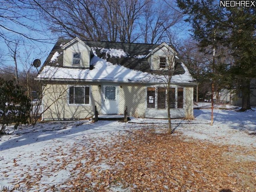 Three/four BR - possible 6 BR has w/2nd full bath on lower level. 2 bedrooms changed to family rm & den, can be changed back. Large lot w/privilege and access to Springfield Lake.  Equal housing opportunity.  Property sold AS IS.  FHA insurable w/escrow.