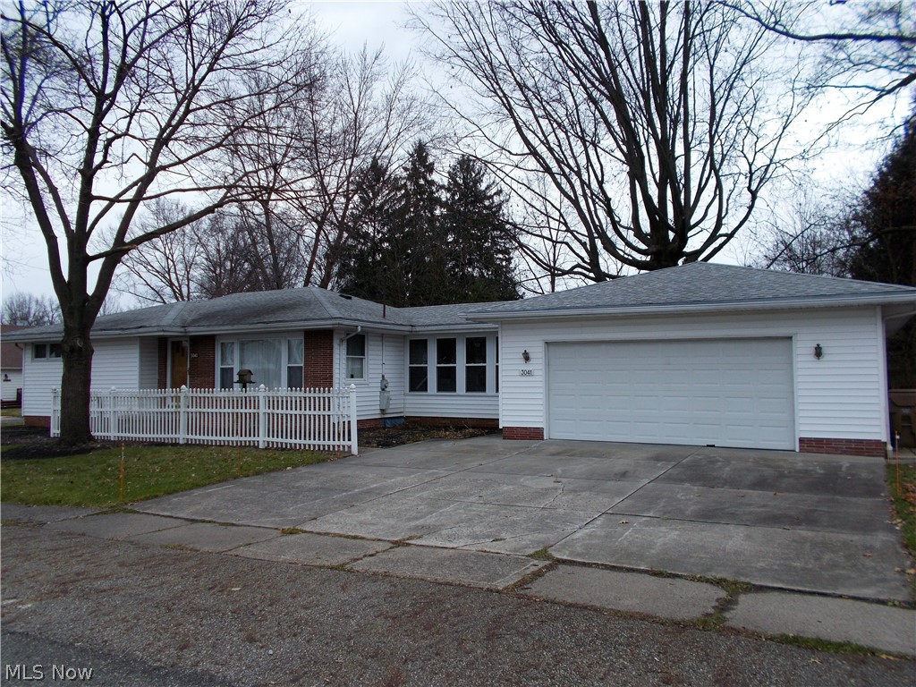 Cuyahoga Falls Ranch close to schools, shopping and minutes to RT 8. Nicely maintained with spacious applianced kitchen and a sunny morning room eating area. Large master with double closet and 2 more bedrooms with beautiful hardwood oak floors. The living room will accomodate a sectional sofa with ease. The partially finished basement feature a rec rom with bar, pool room (the pool table and accessories stay). Updated furnace. Some newer windows. The knotty pine breezeway with convenient half bath attaches to the 23 x 40 4 car garage w/opener and workbench. This home is dated with lots of wallpaper and carpet.
