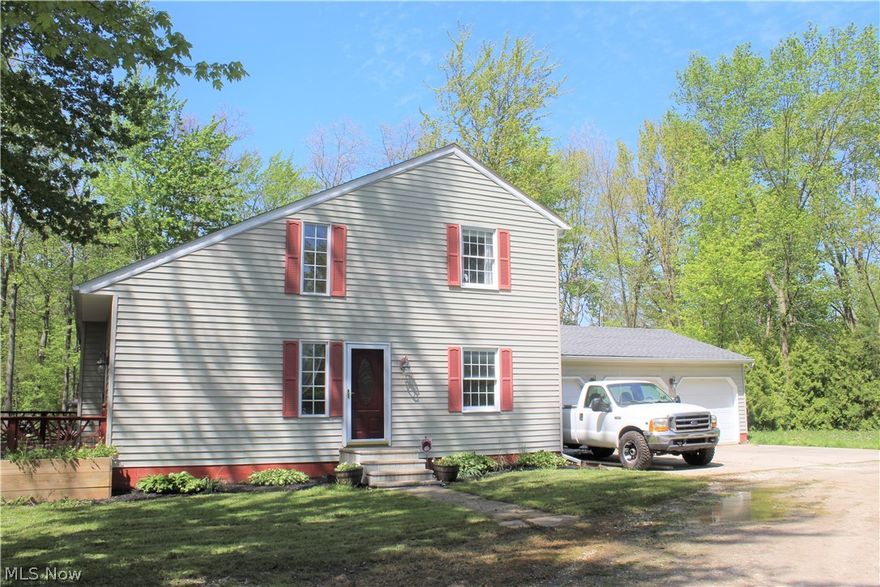 This 3 bed, 2 full bath, home is situated on 2.67 acres in lovely Thompson, Ohio. The brick fireplace is located in the oversized living room with a vaulted ceiling and skylights. Follow the wood floor that leads up the stairs to the landing on the second floor. At this landing is a balcony that you can look down onto the living and dining room on the first floor! Not only is the kitchen spacious, it has a pantry closet and an additional closet for storage. In fact, this entire home has plenty of storage throughout. The home has forced air, electric heat and if you prefer, also has the option to use a wood pellet stove. The yard has a park like setting with plenty of privacy. Just off of the large deck is a quant little "frog pond" with a small fountain. If the attached, 3 car garage doesn't have enough space for you, the outbuilding can catch the overflow. The roof was done about 5 years ago.
