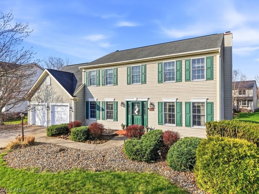 Welcome to this beautiful 4-5 bedroom Colonial-style home located in the highly sought after Stonegate Subdivision. Upon entry, you are greeted by luxurious hardwood floors that run throughout most first floor areas. The living room seamlessly connects with the main living areas, providing a welcoming atmosphere for relaxation and added seating. The family room features a large bay window (the home is equipped with Anderson Windows throughout), allowing an abundance of sunlight to brighten the space, while the fireplace offers warmth and comfort during cool winter nights. The dining room continues the elegant flooring and is perfect for dinners, gatherings and entertaining guests. Ceramic tile adds elegance to the spacious kitchen, which includes an eat-in area, an island, and stainless steel appliances (2018). Adjacent to the kitchen, you will find a convenient laundry area, complete with washer and dryer (2024) and an adjacent storage area for added functionality. An elegant staircase with decorative spindles leads to the second level which features four generously sized bedrooms. The Owner's suite includes a spacious walk-in closet, and an expansive en-suite Owner's bathroom. A bonus room that can be used as a fifth bedroom includes an electric fireplace. Newer carpeting (2022) throughout the second floor provides extra warmth and comfort. The lower level offers a spacious rec/craft room, an office with a built-in fireplace, and a theater room equipped with tiered seating/reclining sofas. An electric fireplace and built-in fish tank complete the ambiance of the theater room, making it an ideal space for entertainment. The backyard includes a vinyl deck, and outdoor grill area. A two tiered paved patio area with pergola further enhances the outdoor space. Situated near shops, restaurants, hospitals, and local highways, this home offers convenience and accessibility to everything you need. Don't miss your chance to make this exceptional residence yours!