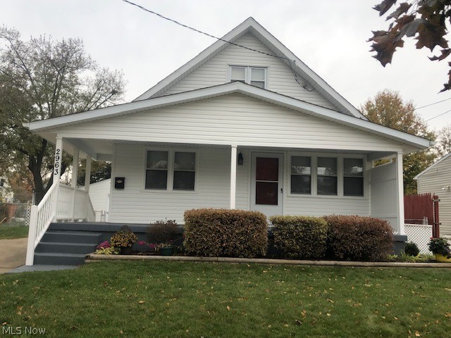 You will fall in love with this 3 bedroom Bungalow that's move in ready. Fresh, clean and move-in ready, new roof on both house and garage, new windows, newer flooring, doors and lighting, and is maintained beautifully. The electrical box has been updated as well. Kitchen has a tile backsplash and newer appliances. This home is freshly painted throughout the entire home. There are 2 bedrooms on the first floor and one large bedroom on the second floor. Basement has newer washer, dryer and wash tub. Nice oversized garage with work bench and large overhang for entertaining on nice days. Must see!!!