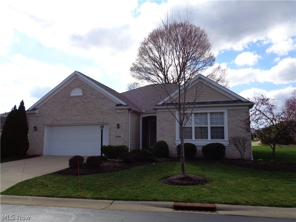 Wonderful free standing cluster home. Large open foyer, Dining room, wood flooring, crown molding and French doors opens into the foyer. Sky light in the kitchen, breakfast bar, double oven, island, cook top. Master bedroom with double closets, full bath double sinks, whirlpool tub and walk in shower. Large patio of the kitchen eating area. First floor laundry with cabinets, washer, dryer, laundry sink. Family room, bedroom and full bath in the lower level adds 1000 sq ft to home. America's Preferred Home Warranty included.
