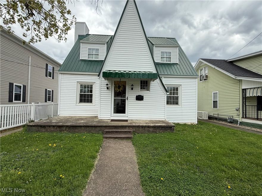 SELLER IS OFFERING UP TO $8,000 TOWARDS BUYERS CLOSING COST AS WELL A 1 YEAR HOME WARRANTY.
Nicely updated 3 BR home with updates including metal  roof, vinyl siding and most windows, new laminate flooring on first floor, refinished hardwood upstairs and new custom storm doors
