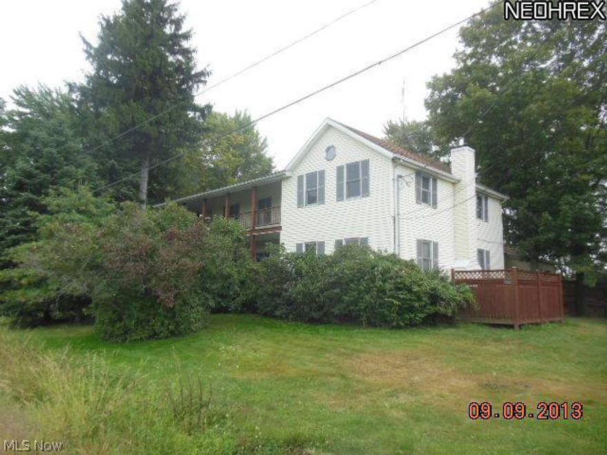 Unique large property nestled on 2 acres! Out bldg/3+ car garage/workshop. Balcony on second floor, hardwood in master bedroom, jet tub in bath. Lots of room and perfect for truck/car buff. Large kitchen and beautiful stone fireplace full height! Some improvements made prior.     Buyer responsible for own due diligence, inquiry and verification of all property information, condition, septic,square footage and parcel data. Broker is not liable or responsible to verify any information as all data in MLS is reflective of public records. Buyers recommended to investigate all data.This property is subject to a 5% buyer's premium pursuant to the Auction Terms & Conditions (minimums may apply). Please note that the commission percentages may change between the pre-sale and auction periods so please see Broker Remarks and site to verify exact commission terms. All auction assets will be sold subject to Seller approval.