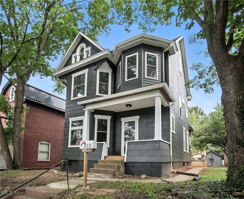 Move-in ready with all the updates already done! This charming home features original hardwood floors and gorgeous woodwork throughout. The updated kitchen boasts brand-new vinyl flooring, cabinets, countertops, stove, microwave, and dishwasher. Bathrooms have been renovated with a tiled surround and a tiled stand-up shower. Major upgrades include a new furnace (2025), HVAC (2021–2022), roof (2024), hot water tank (2025), gutters, siding, and fresh exterior paint. Some new windows, updated electric and plumbing, and convenient upstairs laundry. Enjoy the outdoors on the new wooden deck overlooking a mostly fenced backyard with gated access to a 1-car detached garage. Pocket doors add character and charm. Immediate possession available!