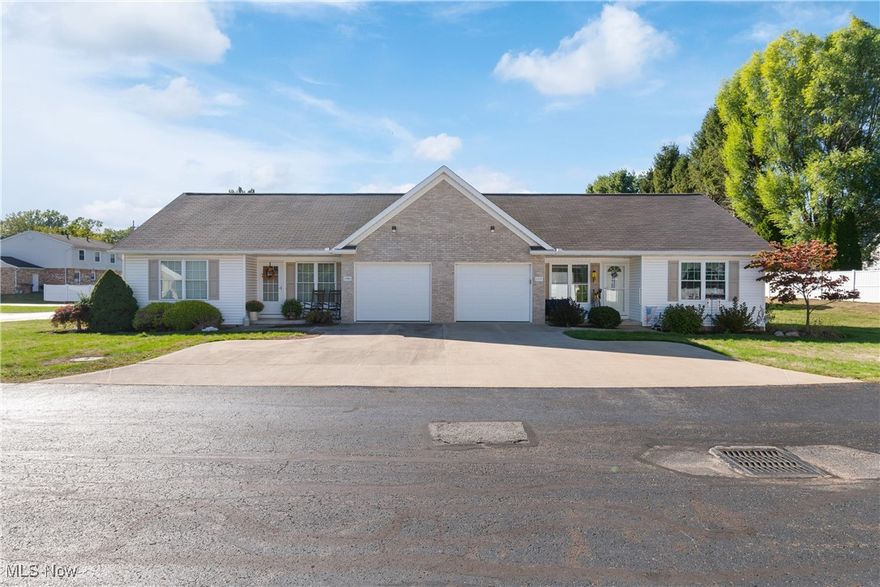 Discover easy living in this updated and well maintained 2-bedroom, 1.5-bath ranch condo at 1153 Tessa Trail in the heart of Hartville! Freshly repainted in 2023, this home shines with modern 2024 updates including new windows, storm door, blinds, carpet, new bathroom vanity, and newer kitchen appliances. The bright main level offers comfortable living with the added convenience of a first-floor laundry hookup, while a second set is available in the lower level. Both bedrooms feature double closets for ample storage. The waterproofed basement features durable Nature Stone flooring, two sump pumps for peace of mind, and endless potential for storage or finishing into additional living space. A chair lift is also included, providing extra accessibility. An attached garage with storage room and a guest parking pad provide convenience. Move-in ready with thoughtful upgrades throughout, this condo is the perfect blend of comfort, convenience, and low-maintenance living in a desirable Hartville location.