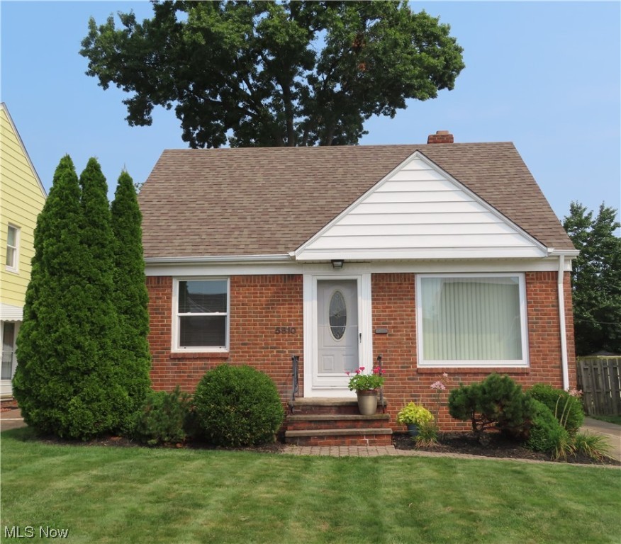 Make sure you put this one on your list of MUST SEE! Great curb appeal! Immaculate, clean 3 bedroom bungalow with a newly remodeled eat-in kitchen. New counters, sink, range, dishwasher and flooring. Plenty of sunlight thru the back door that leads out to a deck overlooking the well manicured back yard. Spacious living room with plenty of sunlight. All rooms have hardwood flooring. The roof was a complete tear off in 2006. Furnace was replaced in 2006 as well. Central Air was new in 2020, Hot water tank in 2018. Vinyl replacement windows compliment the home. The full, finished basement has glass block windows, updated electric box and includes the washer and dryer.