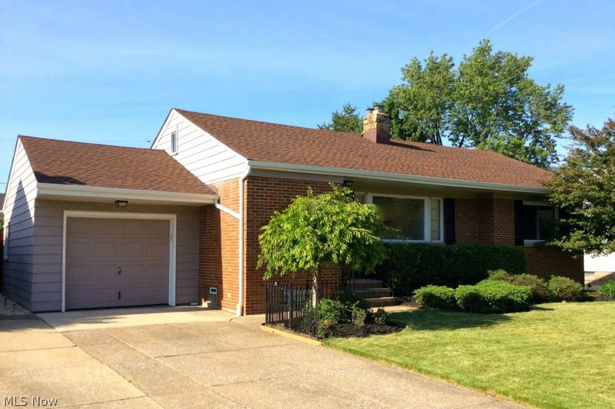 Eat in kitchen upgraded finish w/ appliances/cabinetry you will not find anywhere in this price range! Updated bath, detailed throughout. Finished room & kitchen and laundry & workshop & shower & toilet in basement. Covered deck, open deck overlooks fenced "green" yard with storage barn. Warranty included.Budget Gas $82/Month. Budget elec $74/mo water/sewer