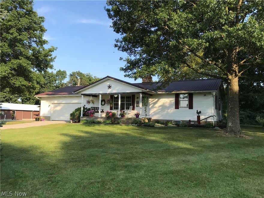 Bring your horses!  3-4 bedroom ranch on 5.3+/- acres.  Double sided stone fireplace in the living room and dining rooms.  Spacious kitchen with breakfast bar.  The lower level is finished with a rec room with whole house wood burner and fourth bedroom.  New metal roof on the home in 2014.  New electric furnace and heat pump in 2017.  Enjoy the scenic country setting from the 18 X 12 deck with pergola.  2 car attached garage with electric heater.  1.5 acres feature an underground dog fence.  40 X 25 concrete lighted basketball court.  80 X 30 pole barn with water and electric.  Freshly painted 40 X 35 frame pole building with new roof in 2017 features 2 horse stalls, hay loft and electric.  Outdoor horse coral, 2 fenced in pastures total 2.5+/- acres.  Beautiful country setting with 4 apple trees, 1 apricot tree and grape arbor.  Adjoins 1,000+/- acres or prime hunting ground with abundant deer, hunting blind negotiable.  Current owners pay average of $170 monthly for electric *average