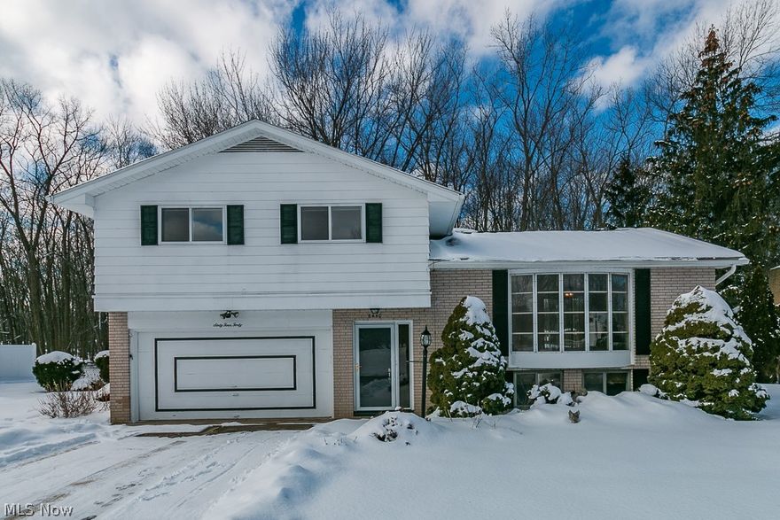 Looking for a great home in a quiet neighborhood? This split level featuring 3 bed 1.5 bath in Mentor is the one! The main floor boasts a large living room with a bayed window for natural light and is open to the dining room with sliders to a wood deck, offering more space to entertain. Eat-in kitchen with all appliances.  Three nice-sized bedrooms and a full bath complete the second level.  The lower level recreation room is a blank canvas and awaits your finishing touches! Original hardwood under all bedroom, dining room and living room flooring. Two car attached garage, shed, fenced in yard, roof ice-guard cable.  Located on a cul de sac street with all the nearby conveniences of shopping, restaurants, schools and more...Roof (2021), Furnace, A/C, HWT (2017).