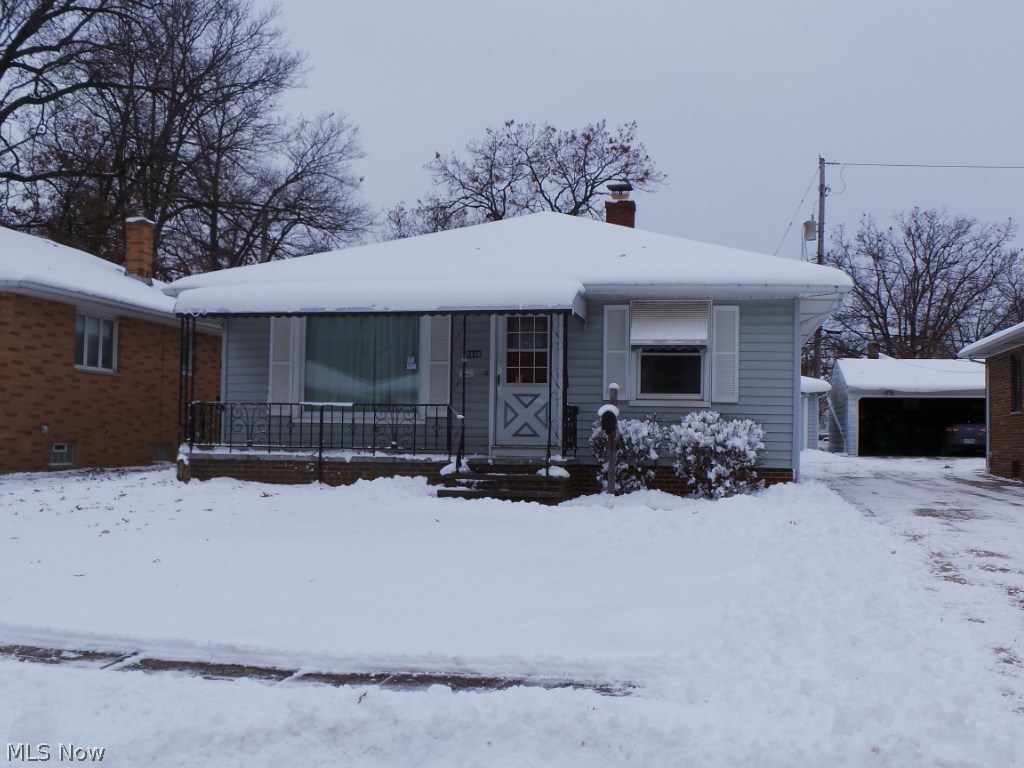 Cozy three bedroom ranch with welcoming front porch. Partially fenced backyard and two car garage. Two full baths, eat in kitchen and hardwood floors. Just a bit of TLC will make this home. Property sold AS IS. Financed offers requires prequal from lender known to seller.