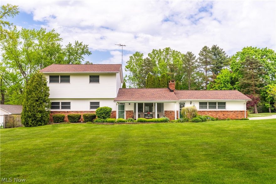 Experience this beautifully maintained, completely move-in ready retreat in the highly desirable Kirtland School District! Situated on a spacious 1.28-acre corner lot, this one-of-a-kind property combines charm, luxury, and functionality with incredible indoor and outdoor entertaining spaces. Step inside to an open-concept layout featuring vaulted wood beam ceilings, a stunning fireplace centerpiece, and seamless flow between the living, dining, and kitchen areas. The updated kitchen offers custom Schrock’s oak cabinetry, granite/titanium countertops, and a cozy breakfast nook perfect for everyday living. The dining room showcases elegant Italian inlay tile and a striking mahogany accent wall that adds warmth and character. Just off the kitchen, you’ll find a walk-in pantry and first-floor laundry room with ceramic tile flooring for added convenience. The spacious family room features a custom-built bar, making this home ideal for entertaining year-round. The private office with hardwood flooring and patio access can easily serve as a potential 4th bedroom or guest suite. Both full bathrooms have been tastefully updated with Italian Statuary marble, custom vanities, and marble countertops, bringing a spa-like feel to the home. Outside, enjoy an incredible entertainment-ready patio, oversized 3-car garages, workshop space, additional storage shed, and even a heated outdoor pet retreat designed for your furry family members. Multiple rooms offer direct patio access, creating effortless indoor-outdoor living.

This turnkey property truly has it all — space, updates, character, and endless possibilities. Homes like this don’t come around often!