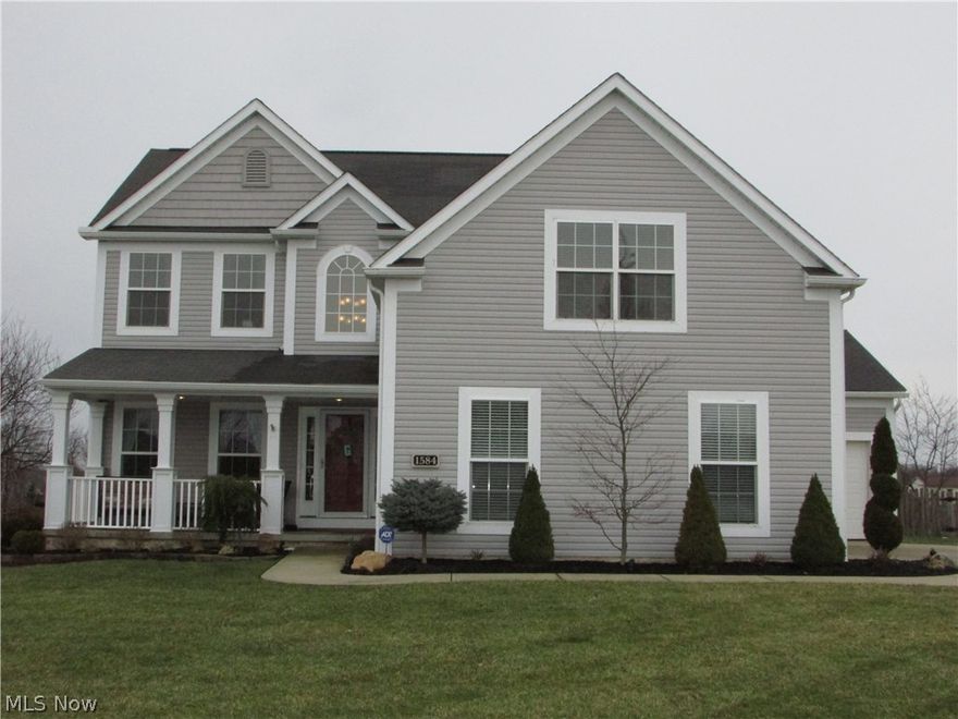 WOW!  Do not miss this 4 bedroom, 2 full and 2 half bath colonial in Hannum Crossing.  This home boasts over 3200 square feet of living space.  The eat in kitchen has updated granite counter tops, flooring, a center island, lighting, and a large pantry.  A fireplace highlights an 18x15 living room.  The master suite features a huge walk in closet and double sinks.  Each of the bedrooms is large, with a second floor laundry.  The newly remodeled finished basement  adds over 800 square feet of space, and has a bar, bathroom, and projection TV.  All of the updates throughout the home are top of the line.  The rear yard is completely fenced with a deck and stamped patio, and overlooks a scenic preserve.  An inground lawn sprinkler/irrigation system covers the entire lot...front and back.  Some of the many amenities include a 3 car garage, security system, second floor laundry, front porch, and so much more.