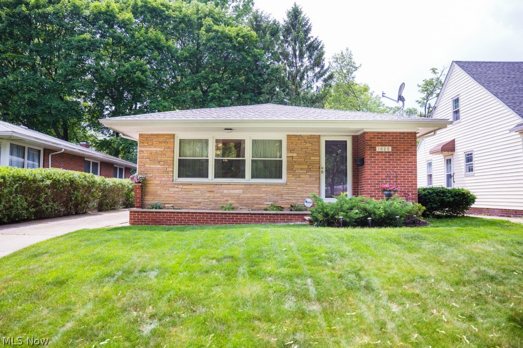 Don't miss out! Centrally located 3 Bedroom Ranch in Akron with a park across the street. 1,149 Square Feet on the main floor of this well decorated home, with an extra 200+ square feet in the downstairs family room that has a built in bar. There is a beautiful patio for outdoor eating and entertaining as well as a large 2+ Car Garage. The layout of this home is great, with the family room, dinning area, and kitchen all centrally attached. There is a concrete driveway with wonderful landscaping outside. The sellers are providing a 1-year Home Warranty in the sale for the buyer’s peace of mind. There are new windows, a newer roof, and the completely Renovated Full Bathroom with Granite counters. Call Today to find out how you may be able to purchase this home for 3% down and move right in.
