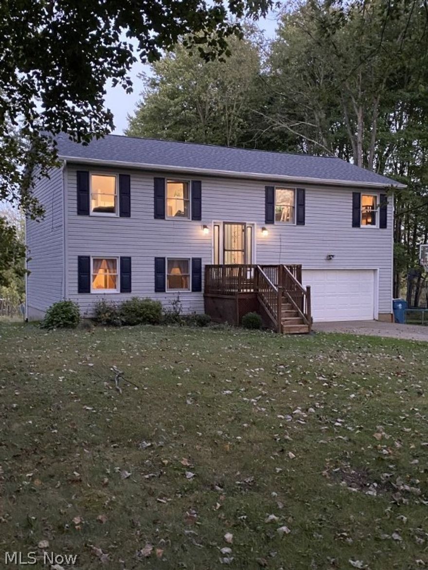 Absolute beauty here with many updates in Green LSD.  This house has the best of all Worlds with just over an acre yard for play and garden with privacy galore.  Love Country living with City ammenities?  Look no further, close to shops, dining, entertainment and easy access to the expressway.  Open floor plan with many updates in this home over the past 8 years including kitchen, both luxury spa baths, one has a walk in enclosed rain shower, the Jack and Jill master access bath allows you to sip on wine while decompressing in a jetted deep soaking tub that keeps water hot all night.  Central Air and furnace 8 yrs new, Brand spanken new roof, gutters and fascia done this month (Sept. 2021).  Enjoy peace of mind with a PetSafe Invisible fence for your fur-family on a dead end street.  Fireplace needs gas logs. Garage has opener, water, drain and entry keypad for times when you lock yourself out or just for the fancy shmancy of it.  So much to love with this house and property.  Kitchen