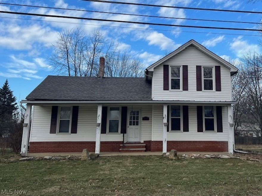 Charming 1900s farmhouse situated on over half an acre between Elyria’s premier University Oaks and The Reserve neighborhoods. Built before residential lighting was commonplace, the large windows and thoughtfully oriented construction flood the bedrooms and living room with morning sunlight and keep the spacious common rooms bright and vibrant into the evening. The massive kitchen opens up onto the elevated wrap around deck giving you a panoramic view of the rolling back yard, twin concord grape arbors, and several large Maple trees. Two garages offer plenty of space for the active family or avid shop hobbyist. The detached garage features a freshly updated electrical panel and dual entry doors, perfect for the DIYer. The property proliferates with peaches, apples, walnuts, plums, grapes, blueberries, and strawberries. All of that, combined with the natural gas well, spring head, and cistern is the perfect combination for that urban homestead. Don't let all that country living fool you