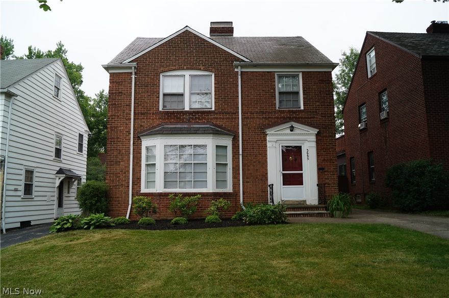 Stately all brick colonial with finished 3rd floor. Spacious living room with large bay window and wood burning fireplace. Formal dining room with built in china cabinet. Stunning renovated kitchen (2012) with lots of cabinets, gorgeous granite counters and separate eating area. Wonderful screened porch for casual relaxing. The second floor features large bedrooms including a master with his and her closets. A hidden treasure is the finished 3rd floor with a full bath perfect for guests or a private retreat. The lower level features a cozy knotty pine family room with built in desk and shelves and a wood burning fireplace plus a large storage area. This home has charm galore with custom fluted moldings, cove ceilings, gleaming refinished hardwood floors. Outside there is a 2 car garage with opener, concrete driveway and newer landscaping. Lovingly maintained, this home is an unbelievable value.