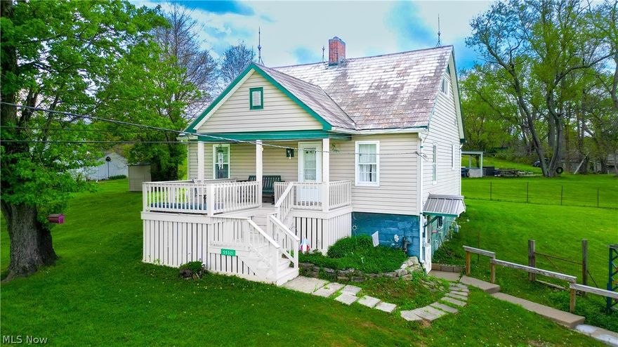 Welcome to a place where slower mornings and quiet evenings feel right at home. Picture yourself starting the day with coffee on the inviting front porch, watching the world go by, and ending it on the covered back deck, perfect for relaxing, grilling, or gathering with friends and family. Set on a level, half acre lot, this charming 1.5-story home offers a comfortable layout with space to spread out, including a main-level bedroom and convenient first-floor laundry. Inside, you’ll find a home that has been lovingly lived in, offering a wonderful opportunity to bring your own style and updates while enjoying its warmth and character. With both a living room and family room, there’s flexibility for everyday living or hosting. Outside, the property features a detached 2-car garage, carport, and even two RV hookups, giving you room for hobbies, storage, or travel-ready convenience. If you’ve been looking for an affordable home with solid bones, outdoor living spaces, and the chance to make it your own, this could be the perfect fit.
