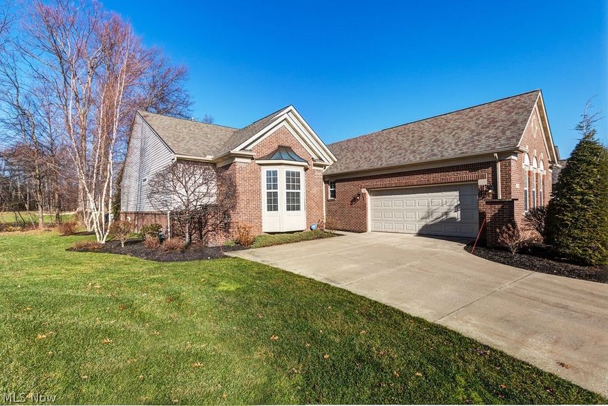 Amazing Describes this one owner freestanding condo with exceptional golf course views overlooking the 3rd hole of the Weiskopf course! you'll love the welcoming front entrance with warm neutral wall tones, wonderful wainscoating throughout and gleaming hardwood floors! Step inside further to see the outside welcomed in by the spectacular wall of windows that soar from floor to ceiling. The dramatic vaulted ceilings throughout this well structured space capture the feel of an open space, surrounded by beautiful built-ins for all your treasures! The dining & great room will not disappoint when entertaining family and friends, especially with an over abundance of space in the very spacious kitchen and oversized island! a grand eating area overlooking the golf course will be admired by all, making you feel like you're on a continuous vacation. Step down into a tasteful patio area to relax and enjoy the view of the tranquil setting. The lovely master bedroom has a dramatic ledge to hold ex