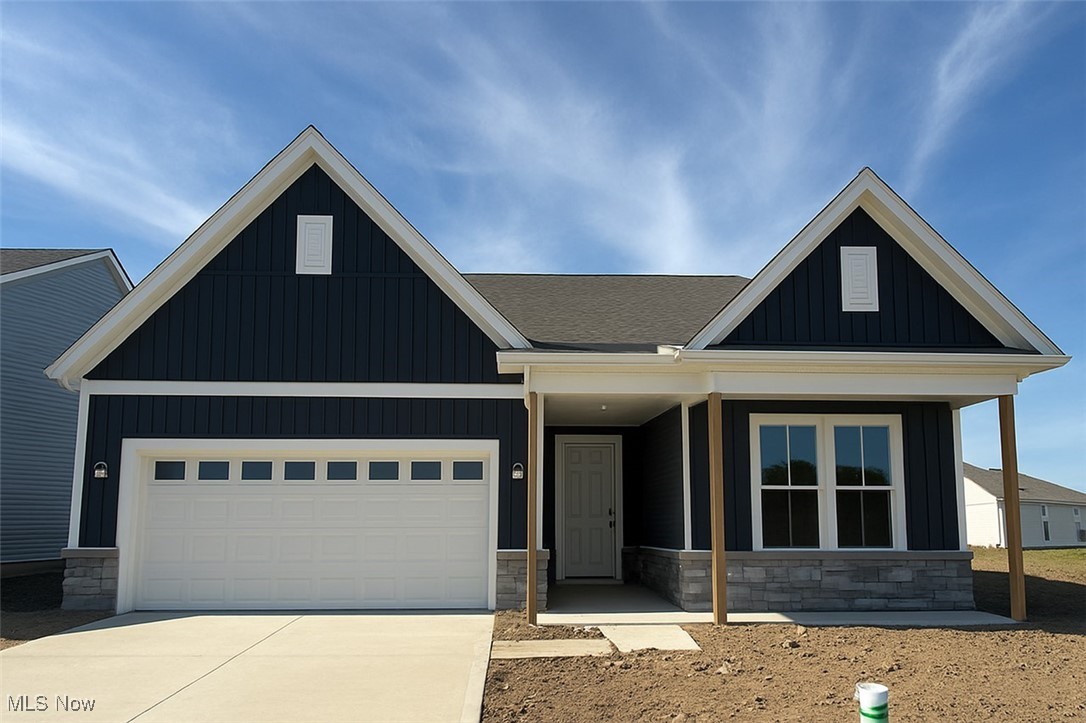 Why wait to build when this stunning, turn-key ranch is ready for you now—beautifully landscaped, and packed with upgrades on a spacious homesite! This ranch-style new home offers the perfect blend of luxury, comfort, and convenience.  The gathering room, with a cozy fireplace, sets the tone for warm gatherings and relaxed evenings. The open layout flows seamlessly into a chef-inspired kitchen featuring a large island, built-in gas range, and premium finishes that make entertaining effortless. The main-level owner’s suite is a true sanctuary, complete with 2 walk-in closets, a double vanity, and a spa-like shower. Your guests will feel right at home in the private ensuite, which includes a walk-in closet and full bath. Need a quiet space to work or create? The flex room offers the perfect escape for productivity or inspiration. Upstairs is a spacious loft, bedroom, and bathroom that expands your living space and lifestyle options. The extended 2-car garage offers extra room for hobbies, or storage for maximum flexibility. Whether you're entertaining or unwinding, the rear covered patio is a true extension of your home. Take advantage of our below market rate special financing, designed to make this luxury home more affordable than ever. With very limited opportunities to own a Ranch style home in Avon Lake, this is THE home for you! Call today to schedule a tour and experience the ease and elegance of luxury turn-key living at Port West.