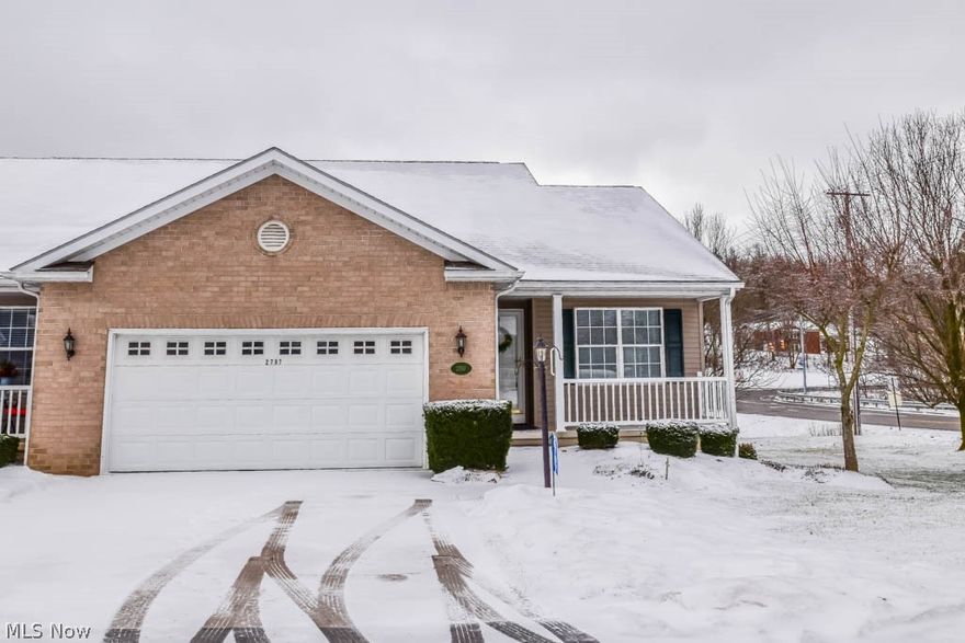 Spacious end unit condo in Perry!  The inviting open floor plan features a kitchen with a new refrigerator, breakfast bar and room for a dining table.  The vaulted great room includes a corner gas fireplace and is open to the bright and cheery all season sunroom with sliding door to a newer elevated deck.  Two bedrooms are on the main level, a master suite with walk-in closet and private bath plus a 2nd bedroom adjacent to the full hall bath.  1st floor conveniences also include a laundry room with utility sink and plenty of cabinets for storage.  The finished lower level adds over 1000 sq ft with a family room that walks out to the patio.  The 3rd bedroom is generously sized, has a double closet, and would be an ideal guest bedroom as it has access to the lower level full bath.  Enjoy carefree condo living in this centrally located community with easy access to parks, restaurants and shopping!