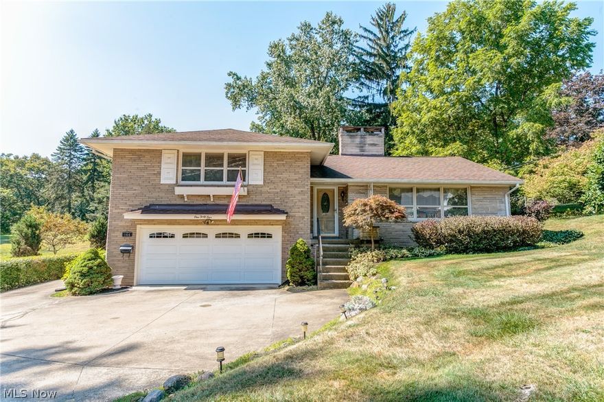 Location! Location! Convenient to North Canton, Canton and I-77!  Spacious and beautifully maintained inside and out - you will love this 2br, 2 bath home!  Open foyer entry to living rm with fireplace, dining rm and great kitchen with stainless appliances and lots of storage.  Access from the kitchen to a large multi-level deck overlooking a beautiful and private backyard - fenced - garden shed too! Spacious rec room with 2nd fireplace - great for entertaining!  Lot of storage, workshop area and gardening/craft room.  2 car garage with more built-ins and storage.  See for yourself!