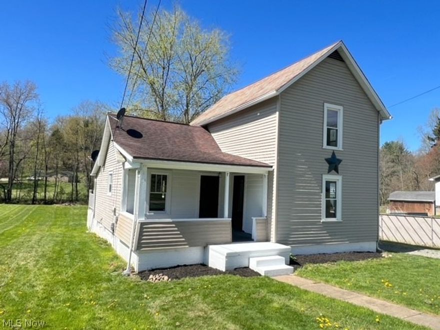 Nicely remodeled home in the Indian Valley school district. This home is ready to move right in with 2 bedrooms, 1 full bath, and a first-floor laundry area. It is situated on a .41-acre lot centrally located between New Phila and Gnadenhutten. There is a large farmhouse kitchen with a center island. The living room and dining room have so much character with arched doorways. There is a first-floor full bath and laundry area. Upstairs are 2 large bedrooms with lots of storage. There is a walk out basement and a storage shed. The dining room could work as a possible 3rd bedroom. Brand new paint and flooring throughout and a brand new central air unit. Immediate possession is available.