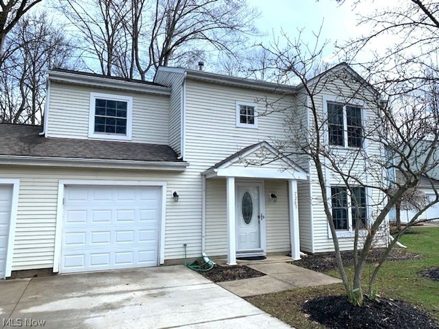 Looking for convenient & affordable living in the Nordonia Hills area? Look no further than this updated, recently painted neutral, & move in ready condo located in the Courtyards of Woodbury with all new flooring as of March 2022!! Entire condo was painted this month!  The HOA gives you maintenance free living including: exterior building, landscaping, snow/trash removal for a low monthly fee. Home has attached private garage w/newer door/keypad-2018 & is an end unit w/no homes behind. Dining area has slider to the patio. Kitchen has all appliances an they will stay and the stove and dishwasher are new.  1st floor laundry that comes with the washer and dryer is nice bonus for convenient living. First floor half bath is recently updated w/vanity, toilet, mirror, lighting, flooring, & paint. Walk in pantry uses the under the stairs space perfectly w/added storage. Upstairs is complete w/3 bedrooms, two larger than expected rooms w/double closets, & overhead fans. 2nd floor full bath is