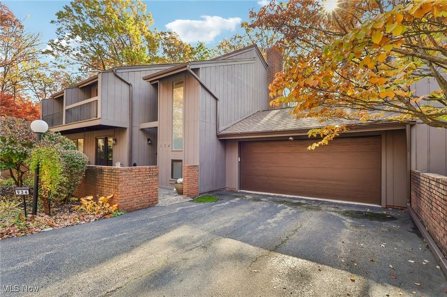 Welcome home to 934 Canyon View Road in Sagamore Hills a beautifully updated 3-bedroom, 2.5-bath condo perfectly positioned against the breathtaking backdrop of the Cuyahoga Valley National Park. Offering 1,668 square feet of meticulously maintained living space, this home combines comfort, style, and function in one exceptional package.
Between 2021 and 2025, nearly every element of this home has been enhanced or upgraded. Step inside to find new engineered hardwood floors flowing throughout, complemented by fresh paint in the lower level, upstairs hallway, and primary bedroom. The spacious living room features a stunning gas fireplace with real stone veneer and starter, perfect for cozy evenings. Enjoy peace of mind with a new furnace (2021), air conditioner, roof, and gutters (2025). The home also features all new windows and two new sliding glass doors, filling each room with natural light.
The kitchen includes brand new stainless steel appliances range, dishwasher, refridgerator, and microwave ready for your next dinner party. Step outside onto your expanded synthetic deck, ideal for entertaining or relaxing with tranquil views of the national park. The updates continue with a new garage door and opener, custom built-in coat closet, custom bar, and custom closets in the primary suite, all designed for convenience and organization.
Additional touches include new light fixtures, ceiling fans, and custom window treatments throughout. Located near the hike and bike trail, this move-in-ready home offers modern living surrounded by nature's beauty. Don't miss this rare opportunity to own a completely updated condo in one of Sagamore Hills most sought-after locations!