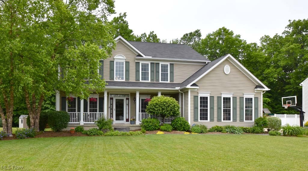 Welcome home, to this grand move-in ready home in Sheffield Village. 4 beds, 3.5 baths. Stunning street view, grand two-story foyer as you enter. Study to your right and formal living room to your left. All new windows with transferable warranty! Very light-filled home! Flowing floor plan on first, connecting kitchen, family room, and morning room. Large mudroom with laundry off kitchen. Fenced in private treed backyard with sub terra drainage, and irrigation in both front and back. Excellent bird watching! Primary suite features sitting room and walk- in closet. All bedrooms spacious. Finished lower level with screening room, AV closet, bar with mood lighting, and tons of finished area for your use. Large unfinished side as well for organized storage. So many closets and options! 1 year home warranty included. Close to i90, French Creek, Metroparks, Dining/Shops. Enjoy attached video tour!