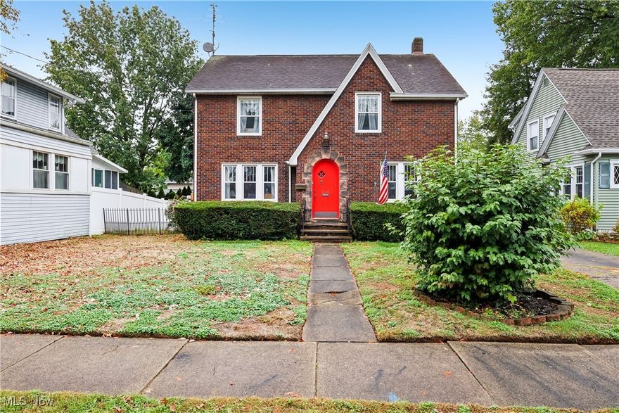 Upper Eastside beauty near the hospital! This all-brick 2-story Colonial, built in 1931, is filled with character and charm throughout. Offering 3 bedrooms, 1.5 baths, and 1,593 sq. ft., plus a finished rec room in the basement—perfect for entertaining or relaxing. The double-entry foyer showcases beautiful natural woodwork and hardwood floors under the carpet. The living room includes a fireplace and French doors leading to the enclosed rear porch. Enjoy a formal dining room with corner cabinet and a kitchen equipped with refrigerator, range/oven, microwave, dishwasher, pantry, and broom closet. The washer and dryer are included, along with an extra refrigerator and freezer. Upstairs you’ll find three spacious bedrooms and a cedar closet for added storage. Outside offers a 50x120 fenced yard and a 2.5-car detached garage with a new door and opener. Convenient half bath on the first floor. A true gem blending timeless charm with modern convenience—schedule your showing today!