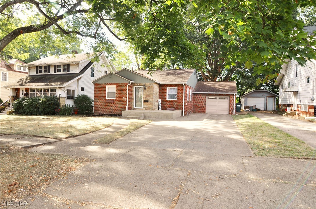 Welcome Home to 334 E Tuscarawas Ave! This spacious two bedroom home has been updated and is move in ready! Enter into your front door and you will be greeted with original hardwood floors newly refinished into your Large Living Room with loads of natural light. Your kitchen has been completely updated with flooring, cabinets and fixtures throughout. Your full size Updated bathroom leads you to your two bedrooms with lots of room for storage and dressers. Your attached one car garage has New garage door and leads out to your private backyard with tons of space for entertaining. Book your showing today as this one will not last!
