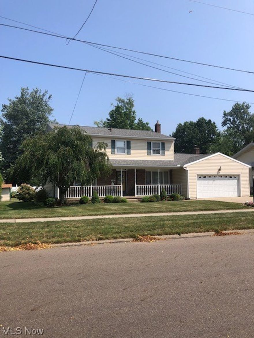 Located in the Heart of Firestone Park this Colossal Colonial with approximately 2200 square feet, a 2 car attached garage, setting on an oversized lot! Well landscaped, fenced yard for your privacy allows you to relax on your patio area after a long day's work. Follow me on a tour of this Gracious Home - Enter from the Front Porch to the Ceramic tile Entryway which features a guest closet and a ½ bath for your convenience. The Entryway gives access to the Dining Room, Living Room and the fully Applianced Kitchen & spacious Eating Area. You will be pleased with all the cabinets and storage areas that the Kitchen offers.  The Eating Area gives access to the Rear Yard & Patio. The Kitchen leads you to the Family Room with the Fireplace for warmth & relaxation - note fireplace not used for some time and should be checked - On the Upper Level with 4 spacious Bedrooms & features double closets.  Master Bedroom has 2 double closets and a Full Private Bath. Main Bath off Center Hall and extra