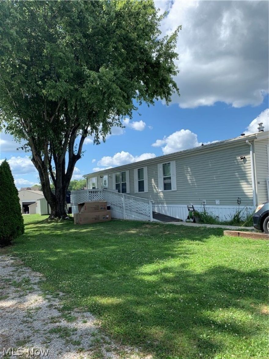 Check out this freshy painted and updated manufactured home located on a rental lot. Features a very spacious 3 bedroom and 2 full bath home. Master bath has a newly installed walk-in bathtub. Refrigerator, stove/convection oven both new. New metal roof installed 2021, new hot water heater, new flooring in living room, dining room, and kitchen, new toilets, new faucets, and some updated light fixtures. New deck with ramp. Great location near many amenities in Maysville school district. Lot rent is $290 a month, which includes, water, sewer, and trash. Potential buyer must fill out an application and be approved by the park.