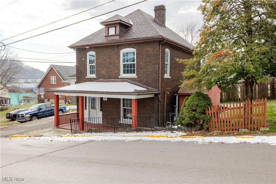 This fully remodeled 3-bedroom brick home sits on a generous corner lot and is ready for immediate possession. The main floor offers a welcoming entry with refinished hardwood floors throughout the hallway, living room, and formal dining room. The updated kitchen is partially equipped and features new appliances, a stylish backsplash, and new flooring. A convenient main-floor laundry area is located just off the kitchen, with new hookups already in place.  The second floor includes comfortable bedrooms with fresh paint, new lighting, and new carpeting, along with a completely updated bathroom. The property also boasts a large two-car garage with workshop space. Updates also include a new roof, new exterior doors, new garage doors, new furnace & HWT, new porch decking & new electric panel.  Ideally located within walking distance to many local amenities.