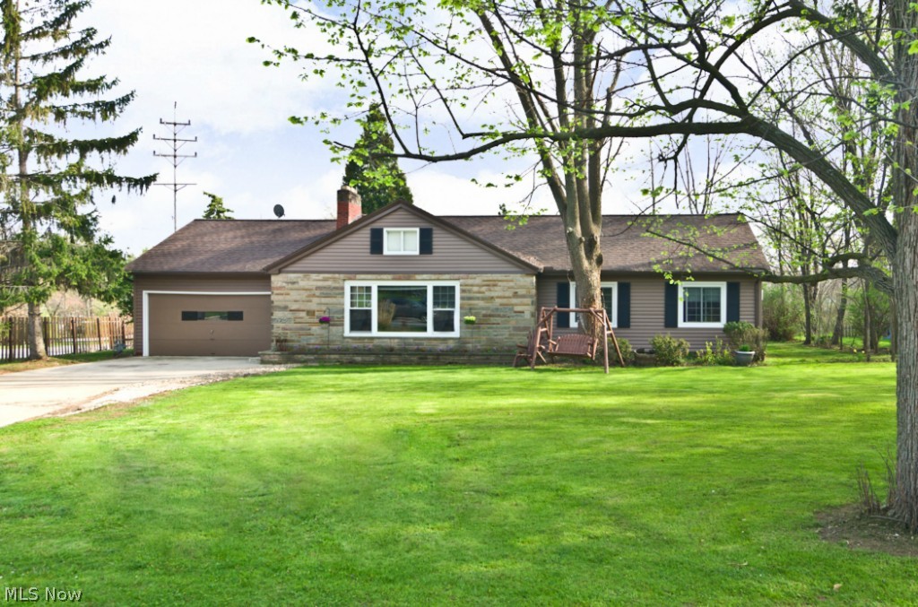 This gorgeous over half an acre Ranch will catch your eye the minute you pull into the either of the 2 driveways! This 4 bedroom, 2 full bath treasure is situated on a corner hillside lot. The open floor boasts a family room with a wood burning fireplace. Tons of cabinet space with a breakfast bar graces the kitchen. The master bedroom has an updated master bath just remodeled in 2014. Enjoy the convenience of having a 1st floor laundry room. No worry about not having a basement - the walk-up 2nd floor has tons of storage space the length of the house. (Photo not shown) The deck is more than enough room to entertain guests for a cookout in the tranquil, wooded backyard. Call today to schedule a showing on this property. It won’t last!