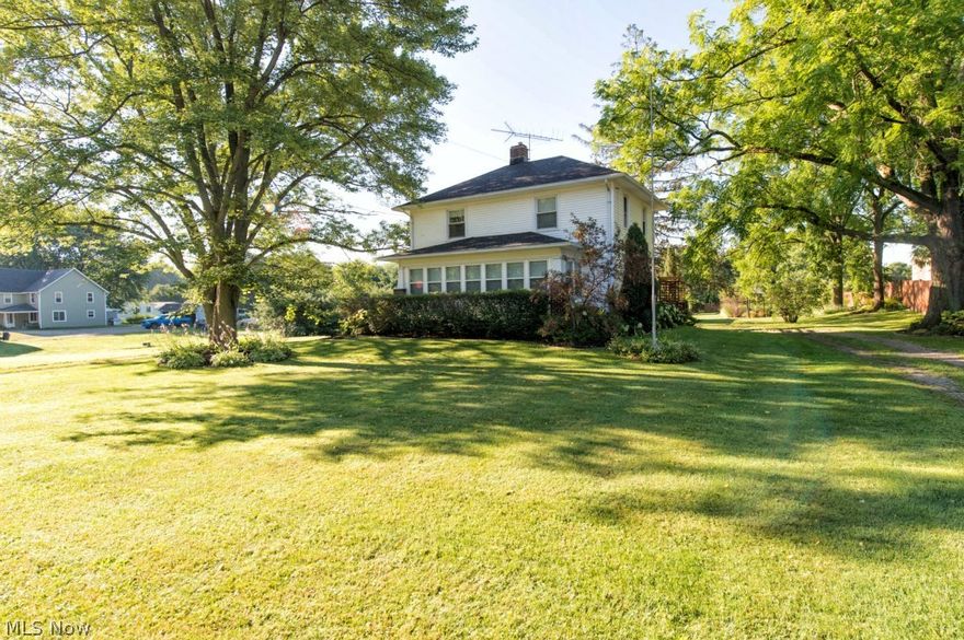 Wow this home has tons of space!  Step through the door & you will immediately fall in love with the original oak & pine woodwork & hardwood flooring that runs throughout the home.  On the main level the owners have replaced the front windows & opened the front porch to add additional space in the living room.  Original wood from the porch was re-purposed to create built in shelving around the gas fireplace.  The kitchen has been updated & leads to a dinette area plus there is a formal dining room with beveled glass French doors.  A half bath is conveniently located just inside the back door.  Upstairs there are three bedrooms that share a full bath which has been updated while keeping the charm of the original bath tub.  For additional living space, head to the lower level where you will find two rooms currently used as bedrooms, an office, bonus room & another half bathroom.  A door from the basement leads to the outside & could be used as a separate entrance.  Once outside you can e