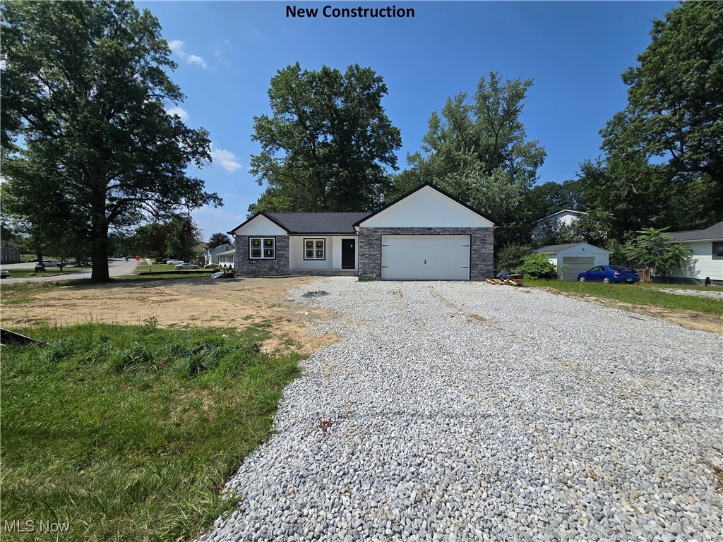 New Construction almost complete in Stow Ohio. Custom quality Built ranch home with open floor plan situated on approx 0.5 acre lot featuring 3 bedrooms,2 baths,2 car garage with 8'H garage door. Full basement plumbed for a 3rd bathroom. Main level laundry .Rear raised concrete patio. Kitchen Appliances included with granite countertops and island perfect for entertaining. Vinyl Plank Flooring in main living area. Must see to appreciate. Builder Warranty included and no H.O.A fees.