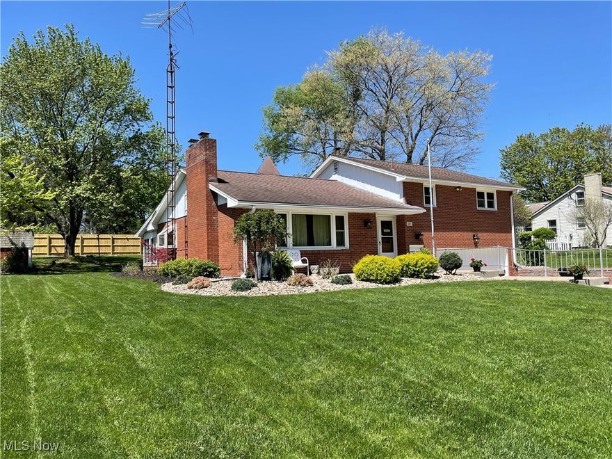 Seller is motivated.  Don't miss out on this one owner brick home in the Neely Manor neighborhood of East Palestine Ohio.  Home has been meticulously cared for over the years and also has many recent updates in just the last few years.  The home features Plaster walls and original Oak Wood floors through-out under the carpeting which has been recently professionally cleaned. As you enter the home through a newer steel front door you'll find a large spacious Living Room and wood burning fireplace with blower.  On to the large eat-in kitchen with dinette.  Here you'll find well cared for light oak laminate floors which are Revival Oak Wilson Art.  There is a large pantry closet here, a wall oven, stove-top range, dishwasher, fridge and newer sink with touch-less faucet and garbage disposal. Dinette has new light fixture and leads out to a newer enclosed porch and back yard with new wood fence and solar lighting.  In the basement you'll find a large Rec room with wood burning fireplace, a laundry room, full bath, water softener and newer furnace with C/A and newer water tank. There is a 100 amp breaker box, glass block windows, a utility closet and new light fixtures through-out the home,  basement and bath. There is a 2+ Car garage that is heated, cement driveway recently repaired and power washed, repointed chimney, newer brick retaining wall, professionally landscaped.  Upstairs you'll find 3 spacious bedrooms - each with a fire alarm and large closets.  The full bath offers a double basin sink and 2 storage closets.  Attic access and storage from bedroom 2.